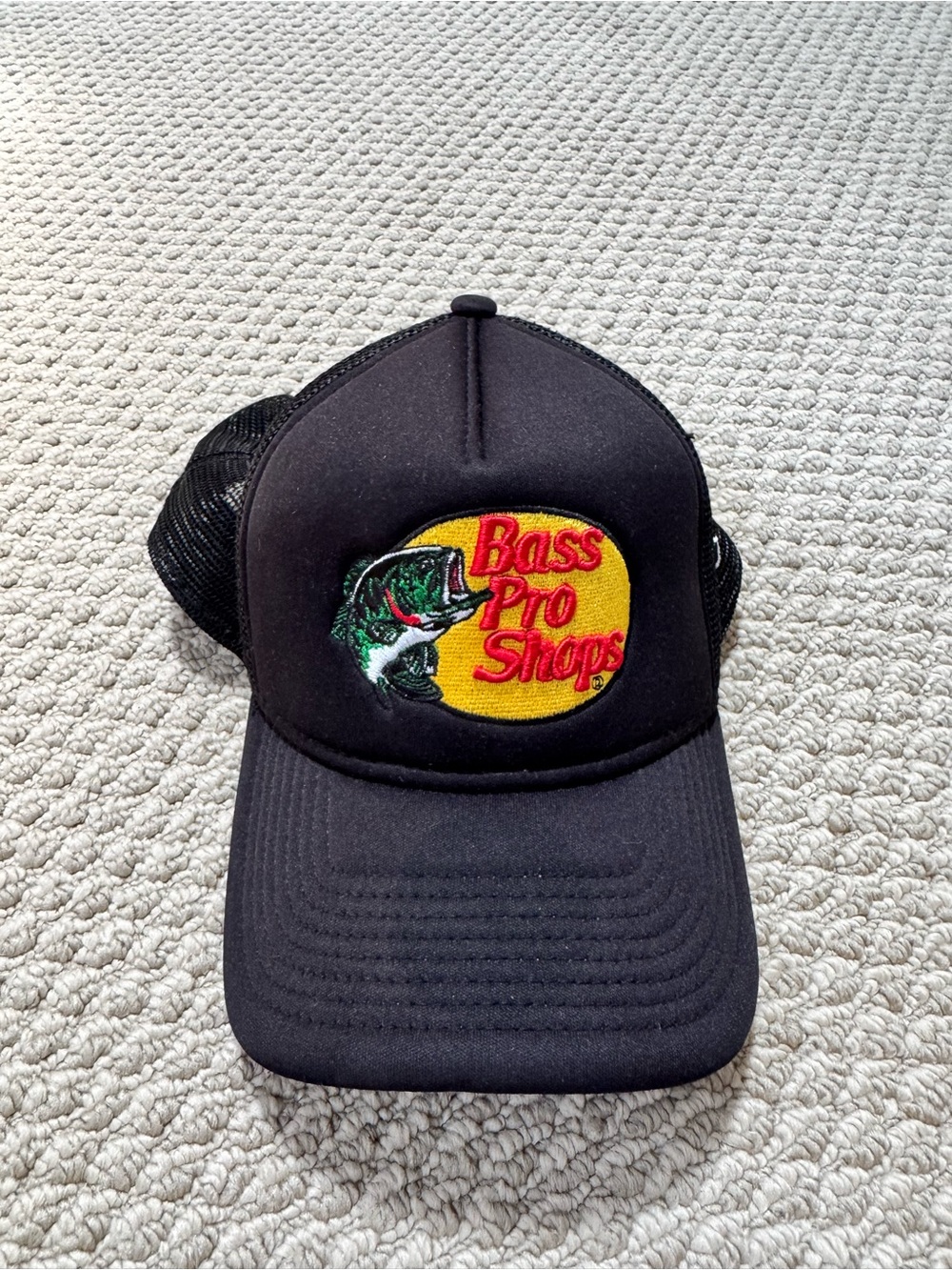 New Era Black Trucker Hat with Yellow & Red Fish Logo